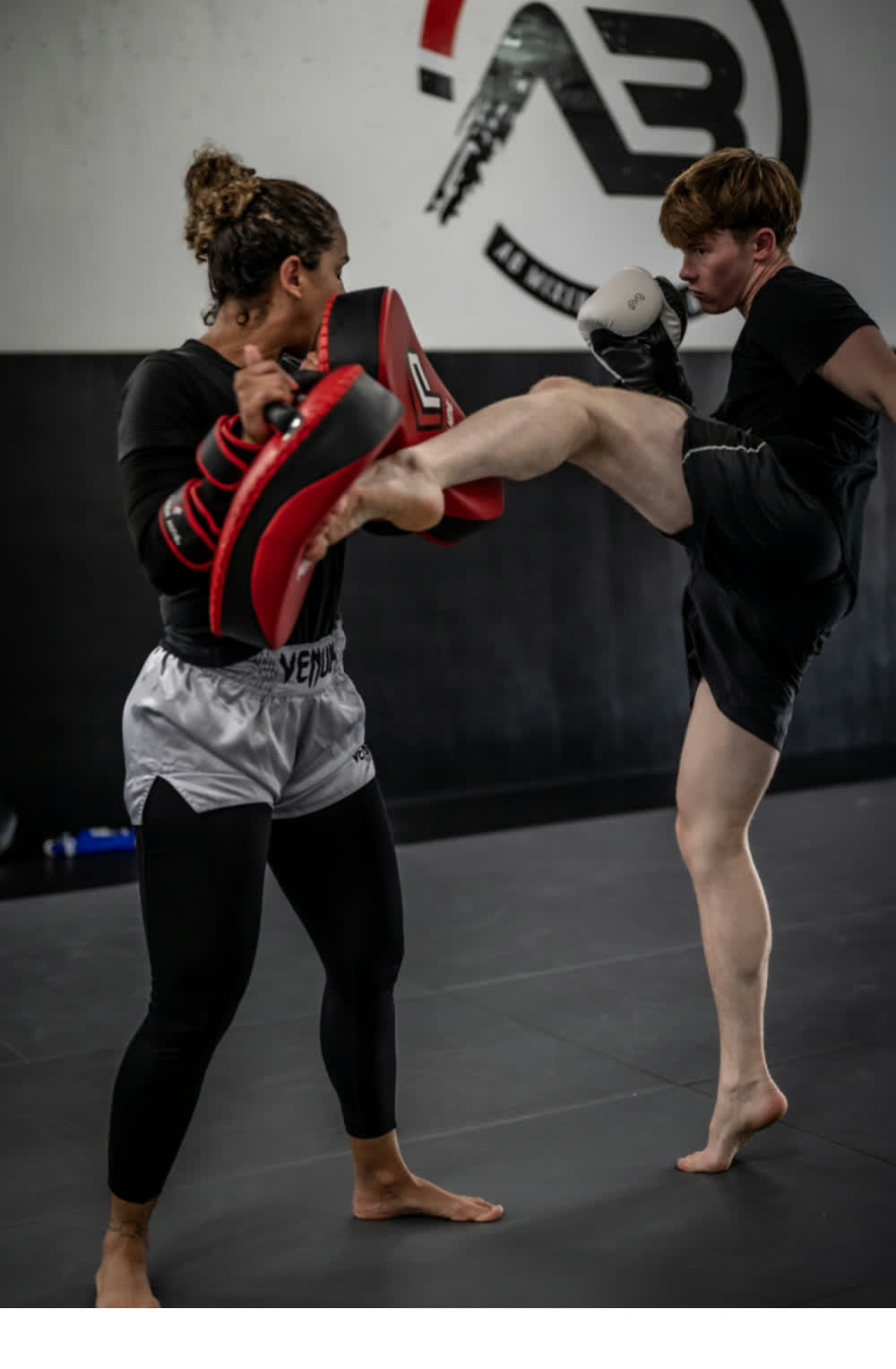 Fabi coaching a fighter in the ring