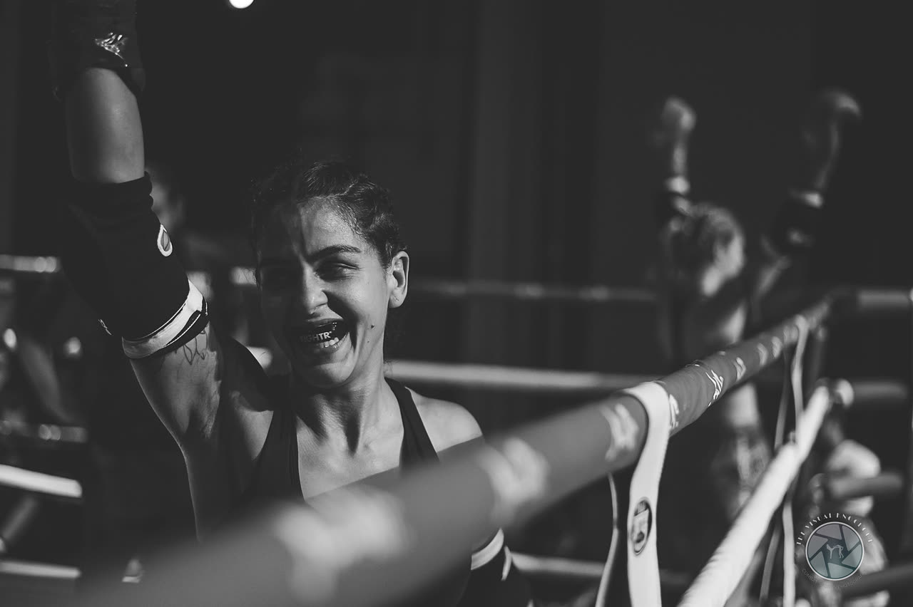 Victory — arm raised by referee
